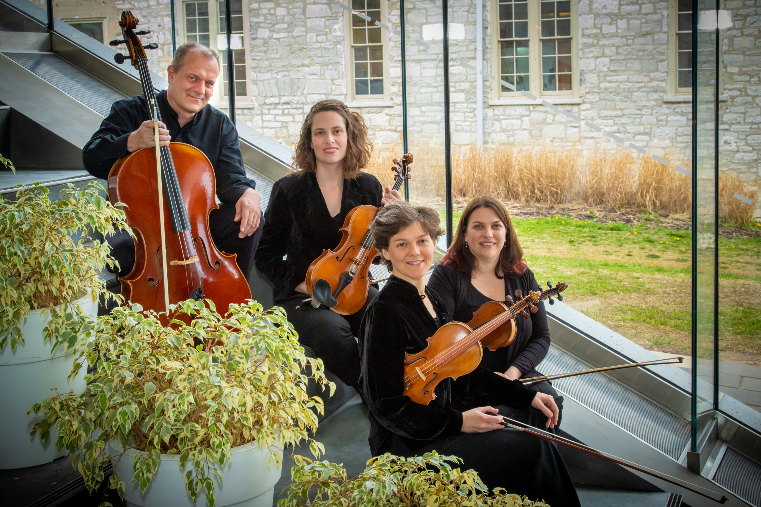 Quartet - 02 Quartet sitting with Tett Centre behind